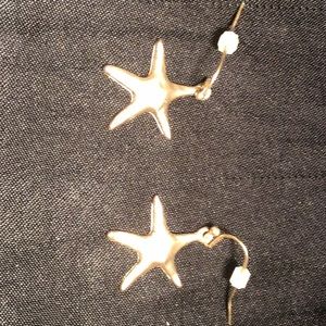 Women’s gold starfish earrings